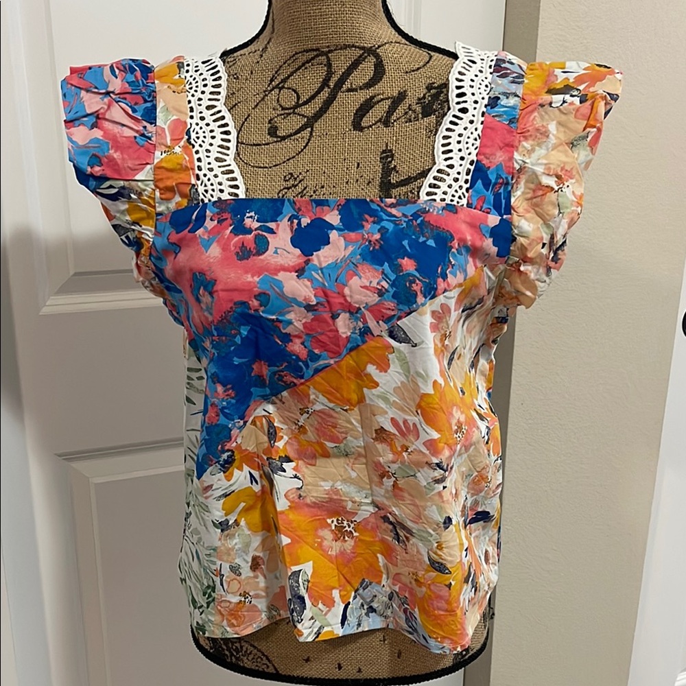 Cupio Flutter Sleeve Blouse in Blue and Orange Floral Design. S